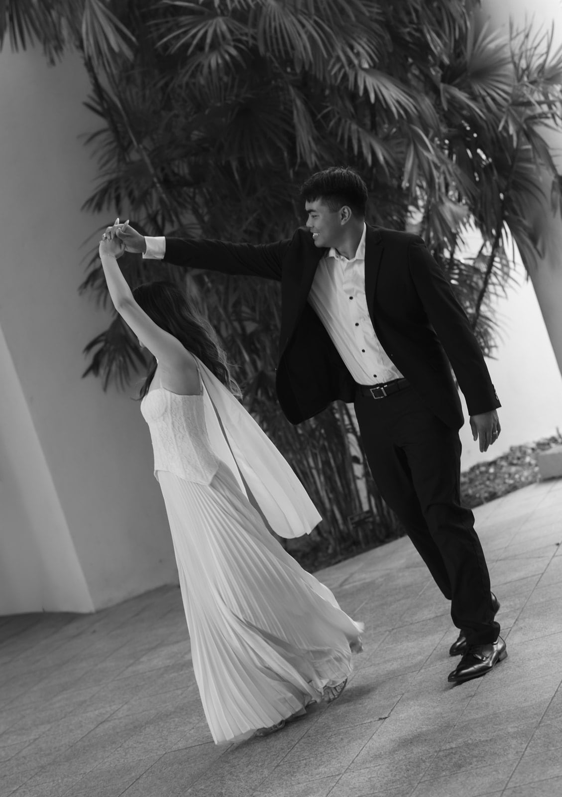 Edwin and Grace dancing during their engagement shoot