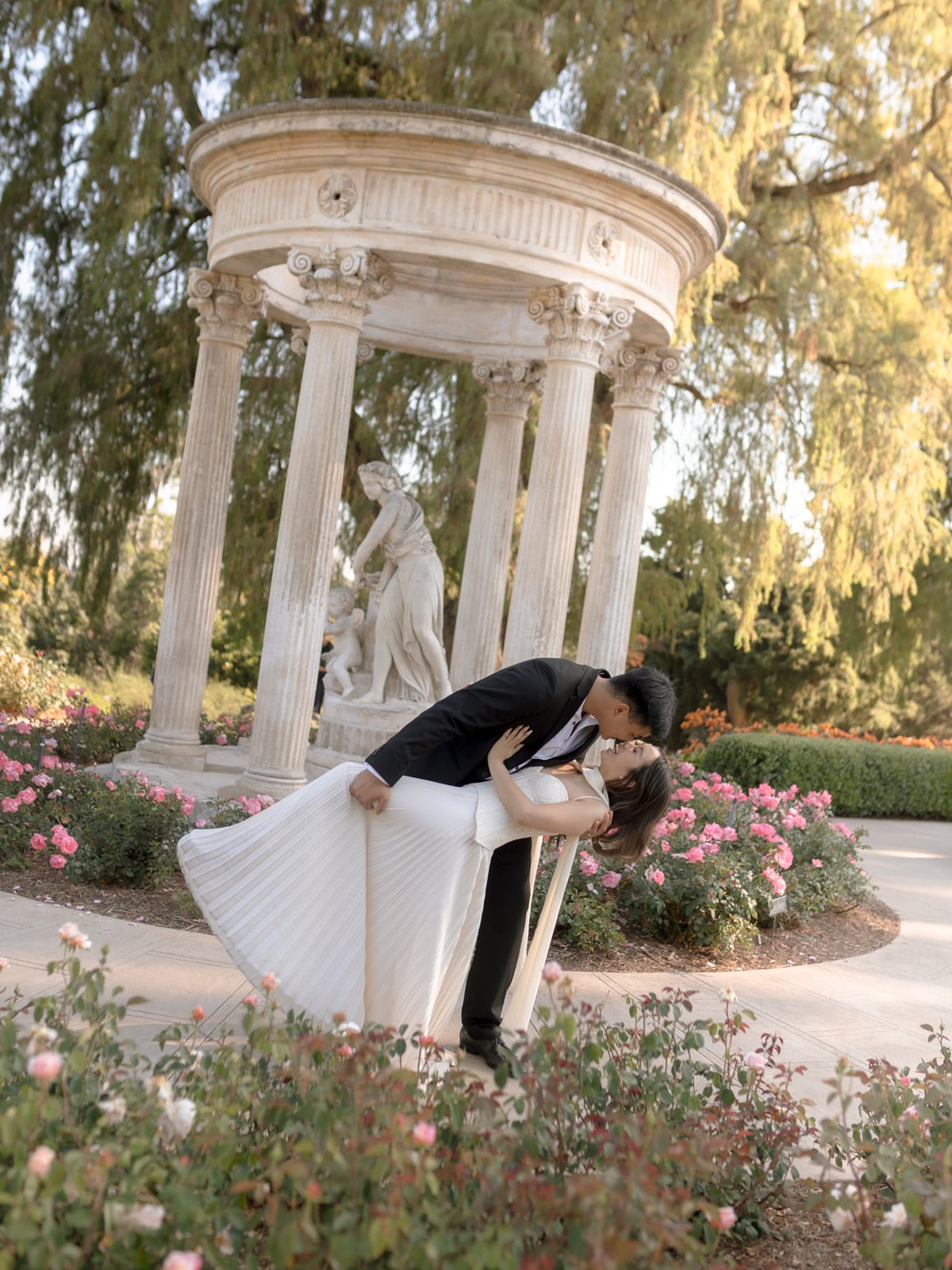 Edwin and Grace posing romantically during their engagement session